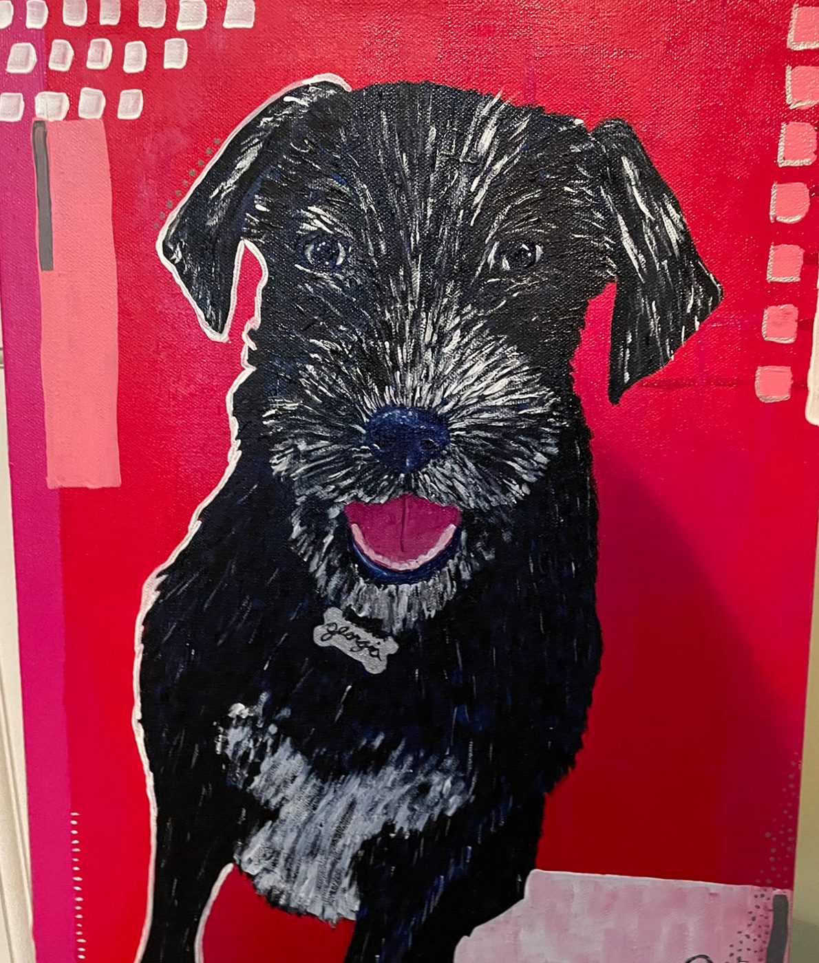 Painting of a black puppy with a name tag on red