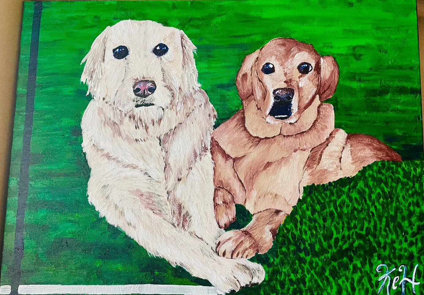 Painting of a white and a golden dog lying on green grass